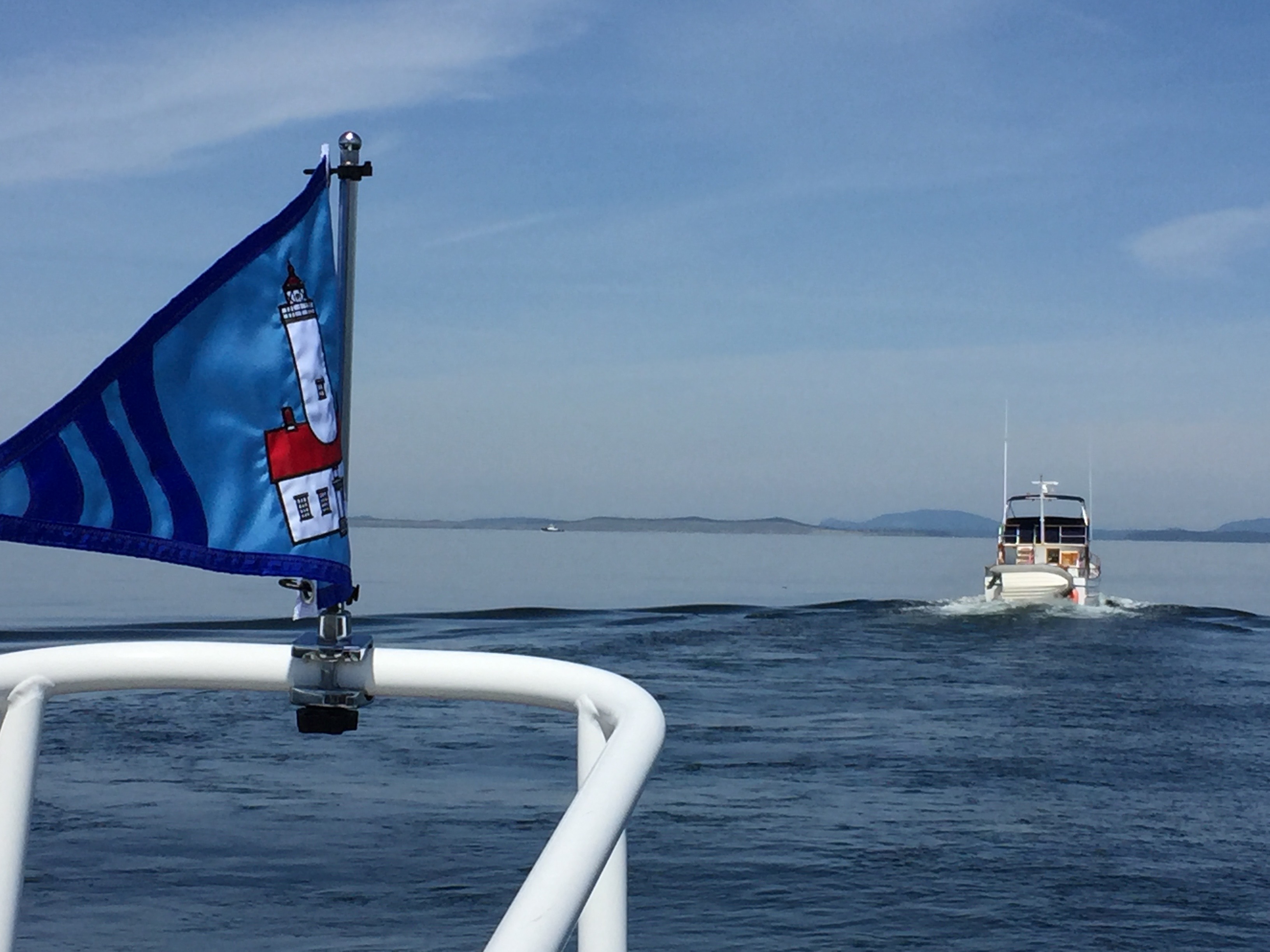 flying the North Olympic Sail & Power Squadron Burgee