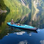 Patti Graft kayaking on idyllic waters