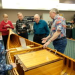 Gordon answering questions regarding his personally built canoe 