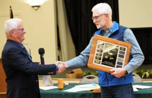 SEO Ray Thomas tcongratulating Educator of the Year Bob Brummett Award, Randy Roberts